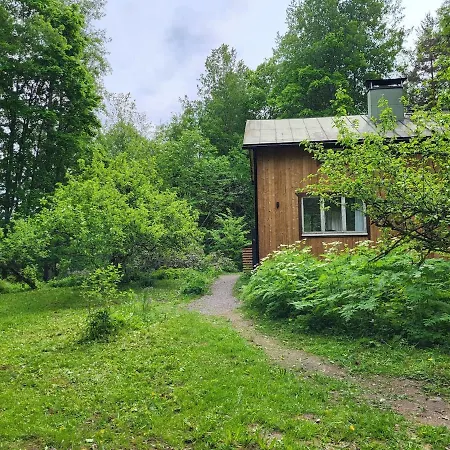 Hattara - A On The Shore Of A Rapid Huvilat